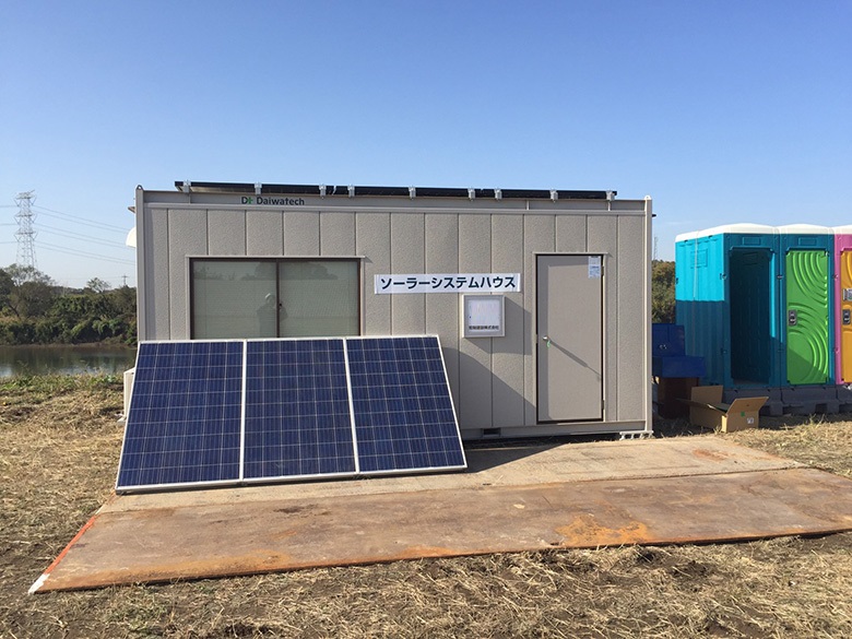 photo of "UseFul" installed in front of our solar power house at a riverbank embankment construction site
